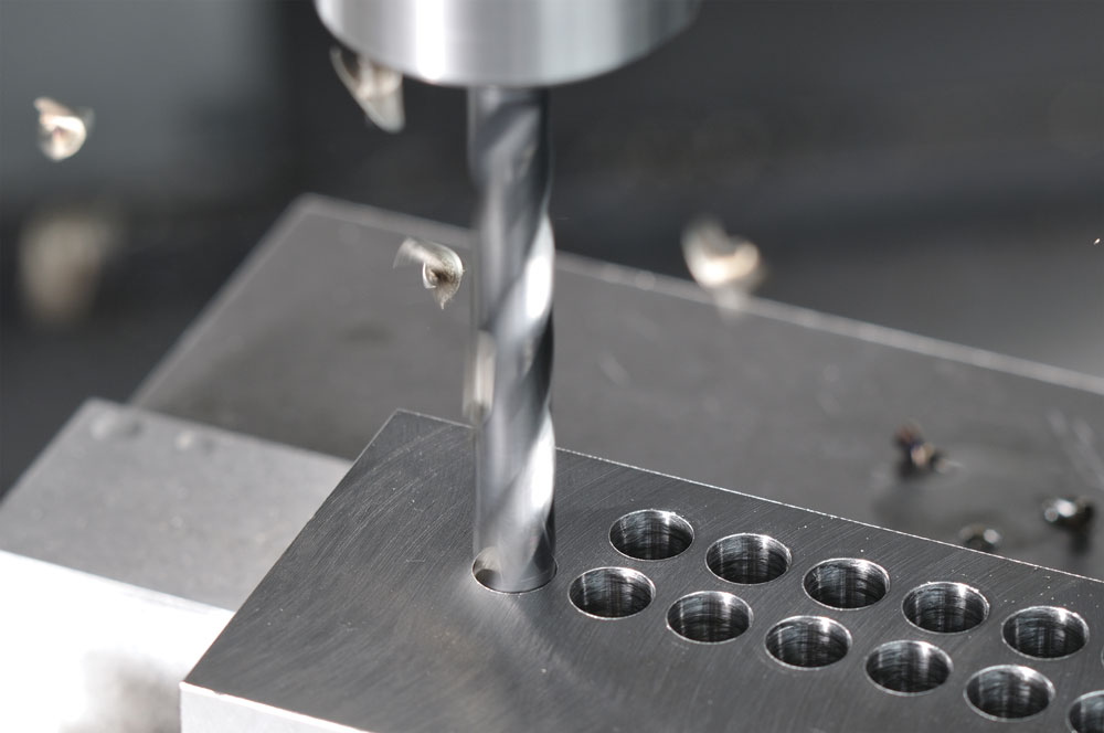 Drilling metal