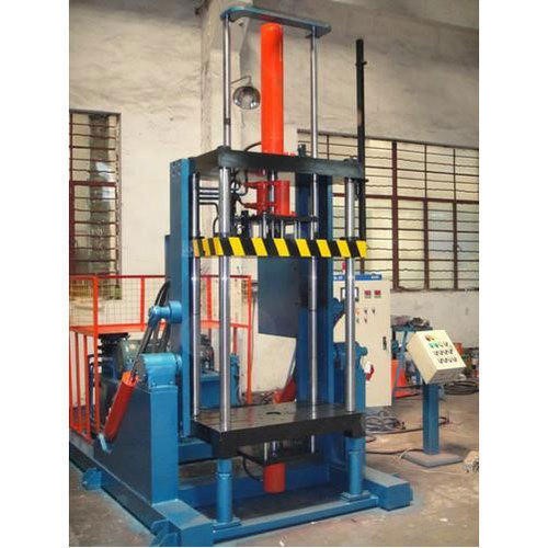 Tilting gravity die casting machine