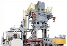 Squeeze die casting machine
