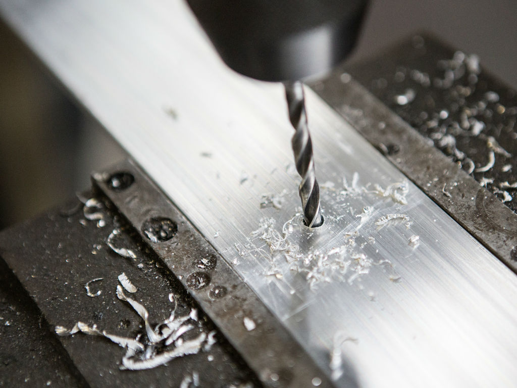 Drilling metal